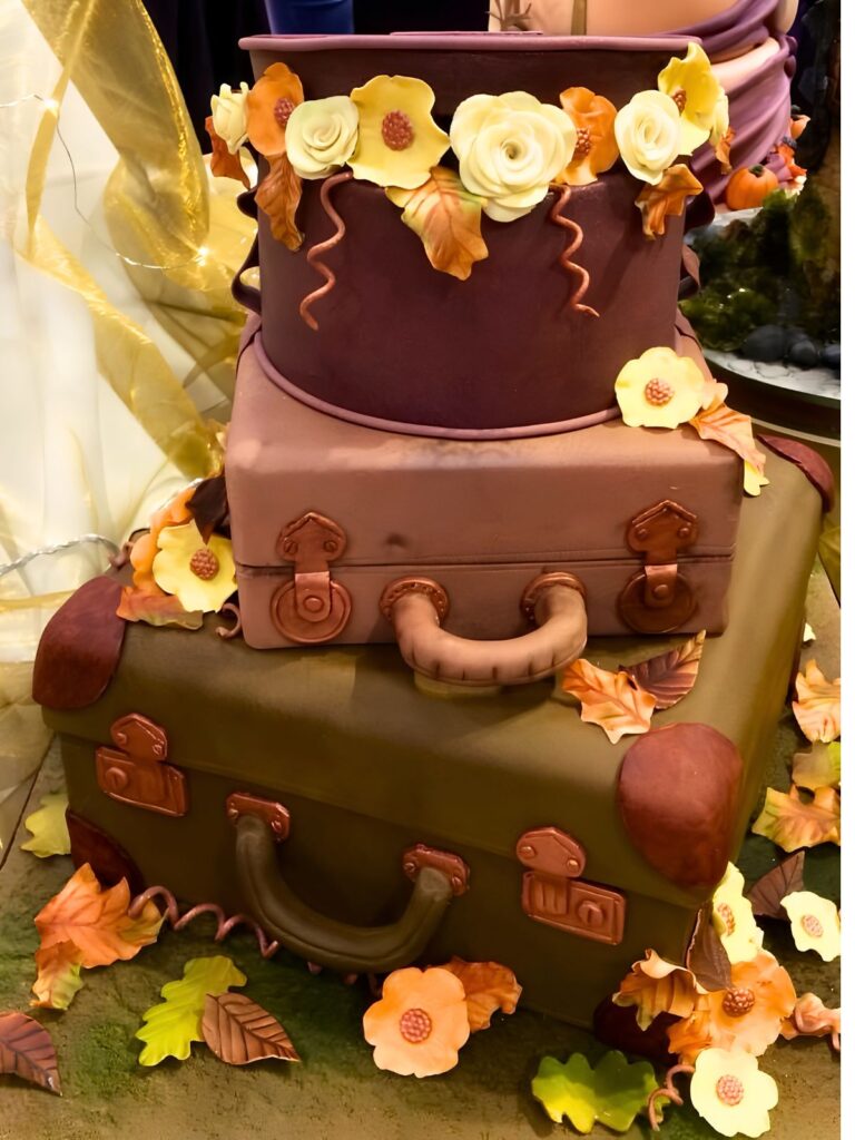 Autumn suitcase cake with sugar flowers and leaves created for Cake International 2017 display