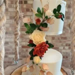 Floating tier wedding cake with handcrafted sugar flowers in Royston, Hertfordshire by Harebell Creations